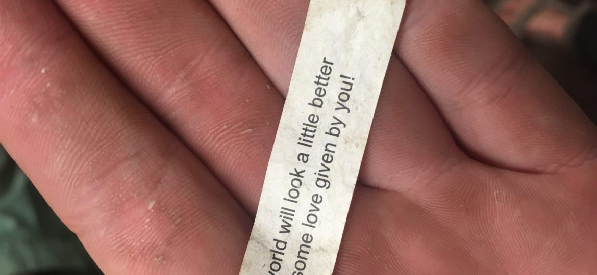 fortune note in hand